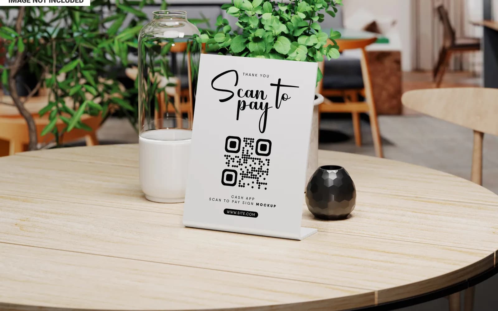 A scan-to-pay QR stand on a café table